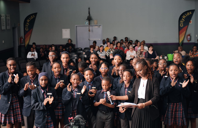 Students with the host Ms Tracy Ncube