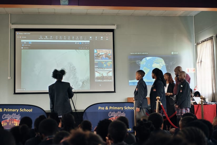 Students speaking with Astronaut Chris Williams.